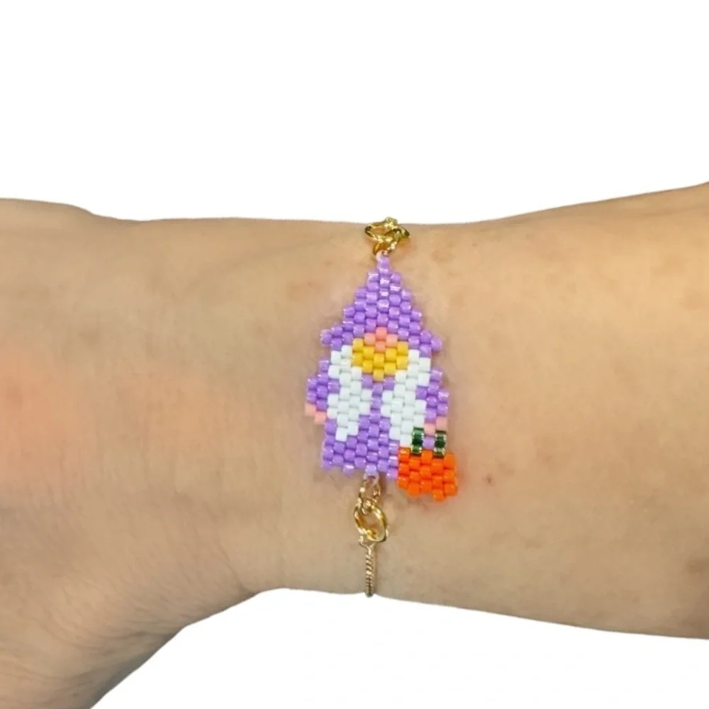 Handcrafted beaded Halloween gnome with pumpkin slider bracelet adjustable